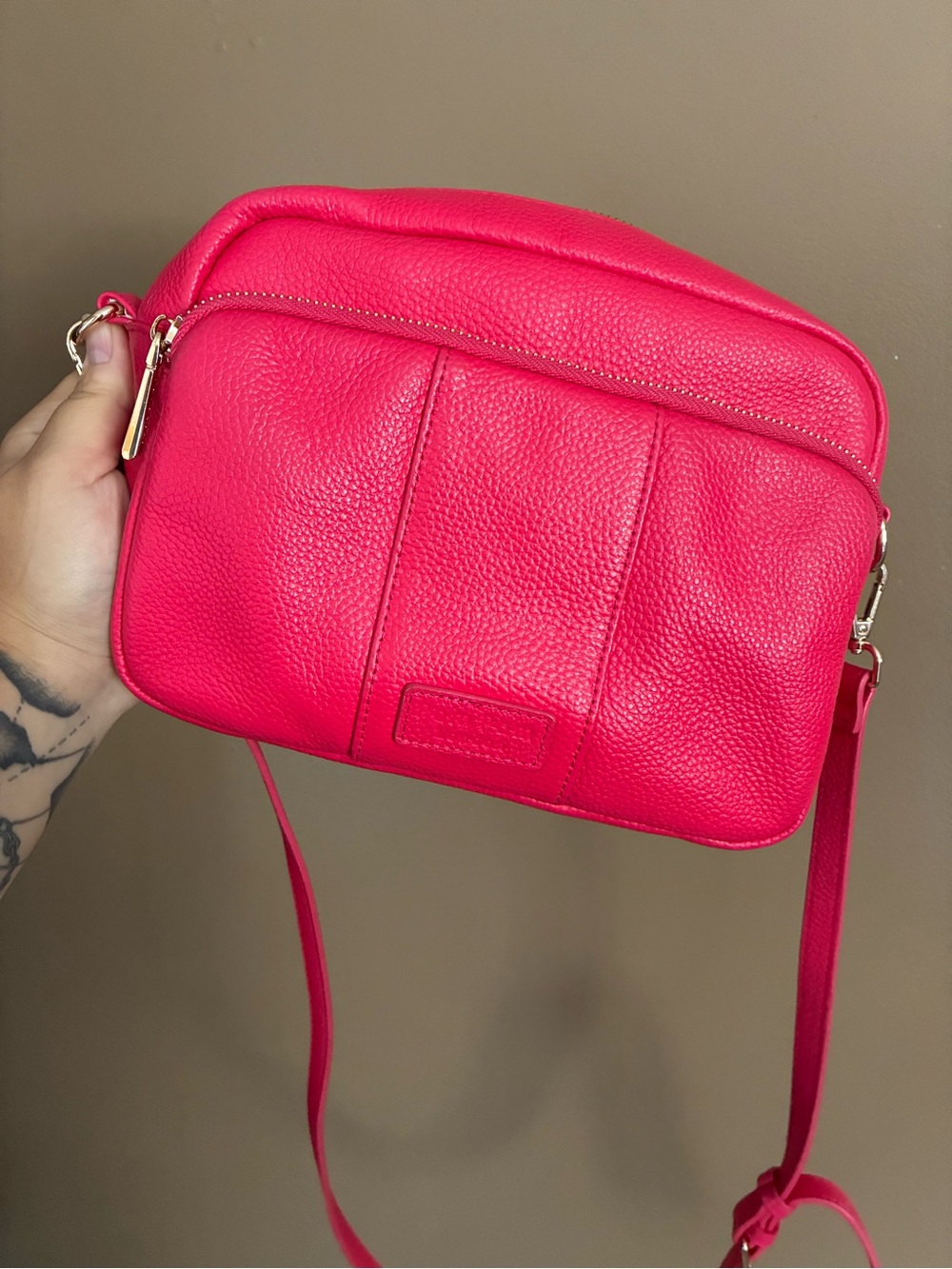 Vibrant Pink Pebbled Leather Crossbody Bag with Gold Hardware